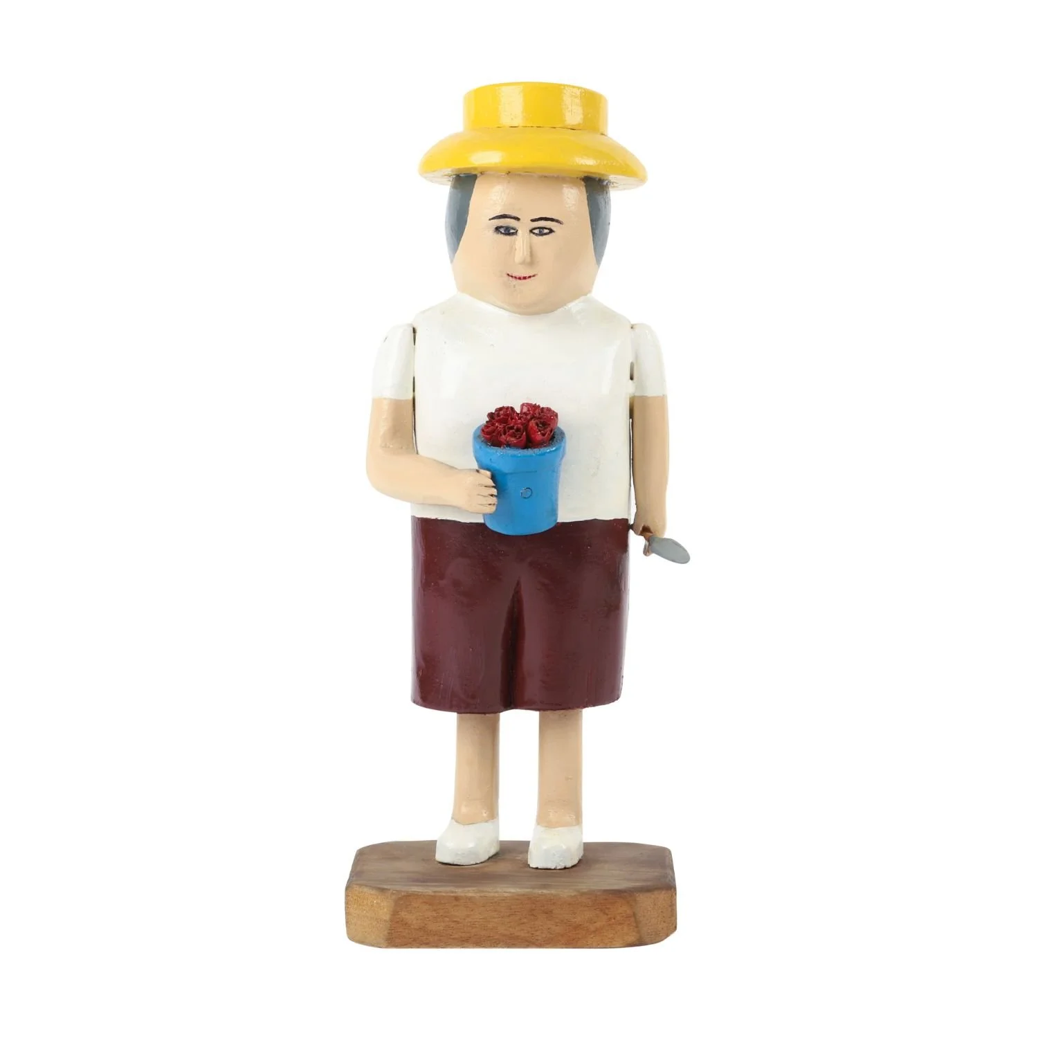 Phyllis Cosman, Rose Gardener - Colourful carved wood figure featuring a sun hat, gardening trowel and roses; sold for CA$2,299.