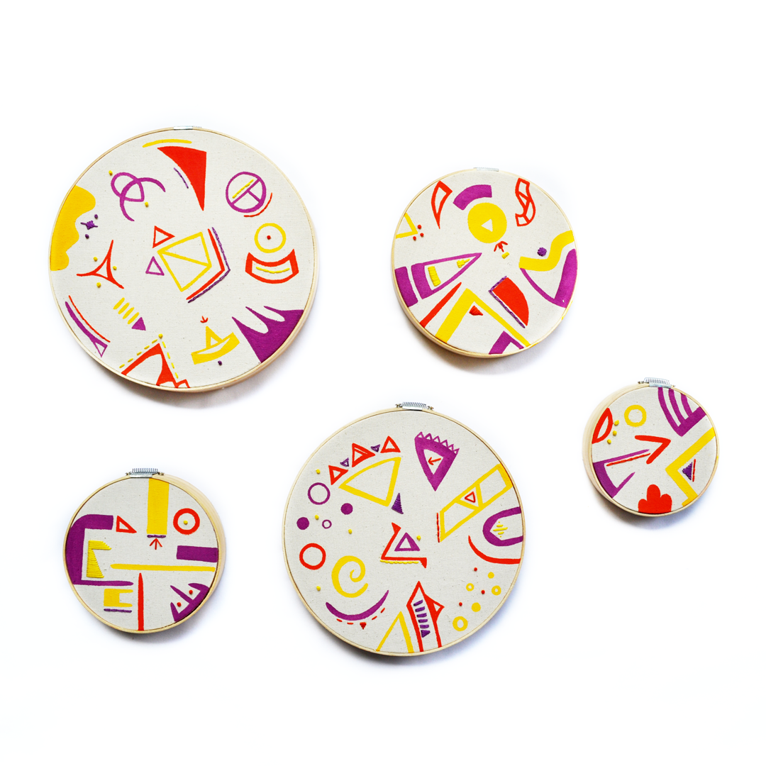 “Untitled”, 2019. Acrylic and embroidery on wooden hoops at a variety of sizes.