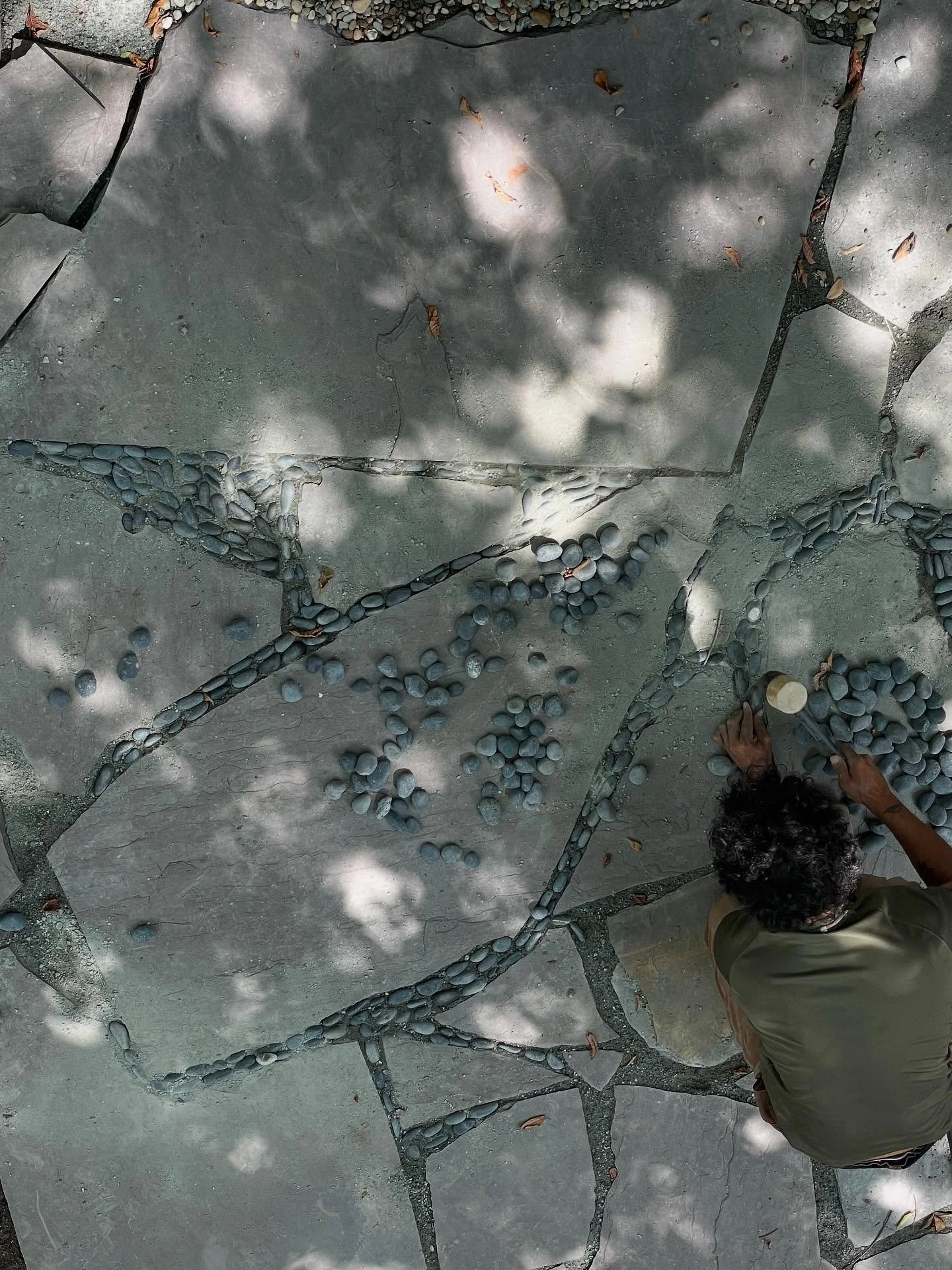 The details 😍🪨💯 Gage putting the finishing touches on this gorgeous stone patio! 

#rockin #stonework #bashaviagardens #hardscape #rockart #winstonsalem #landscape #gardendesign