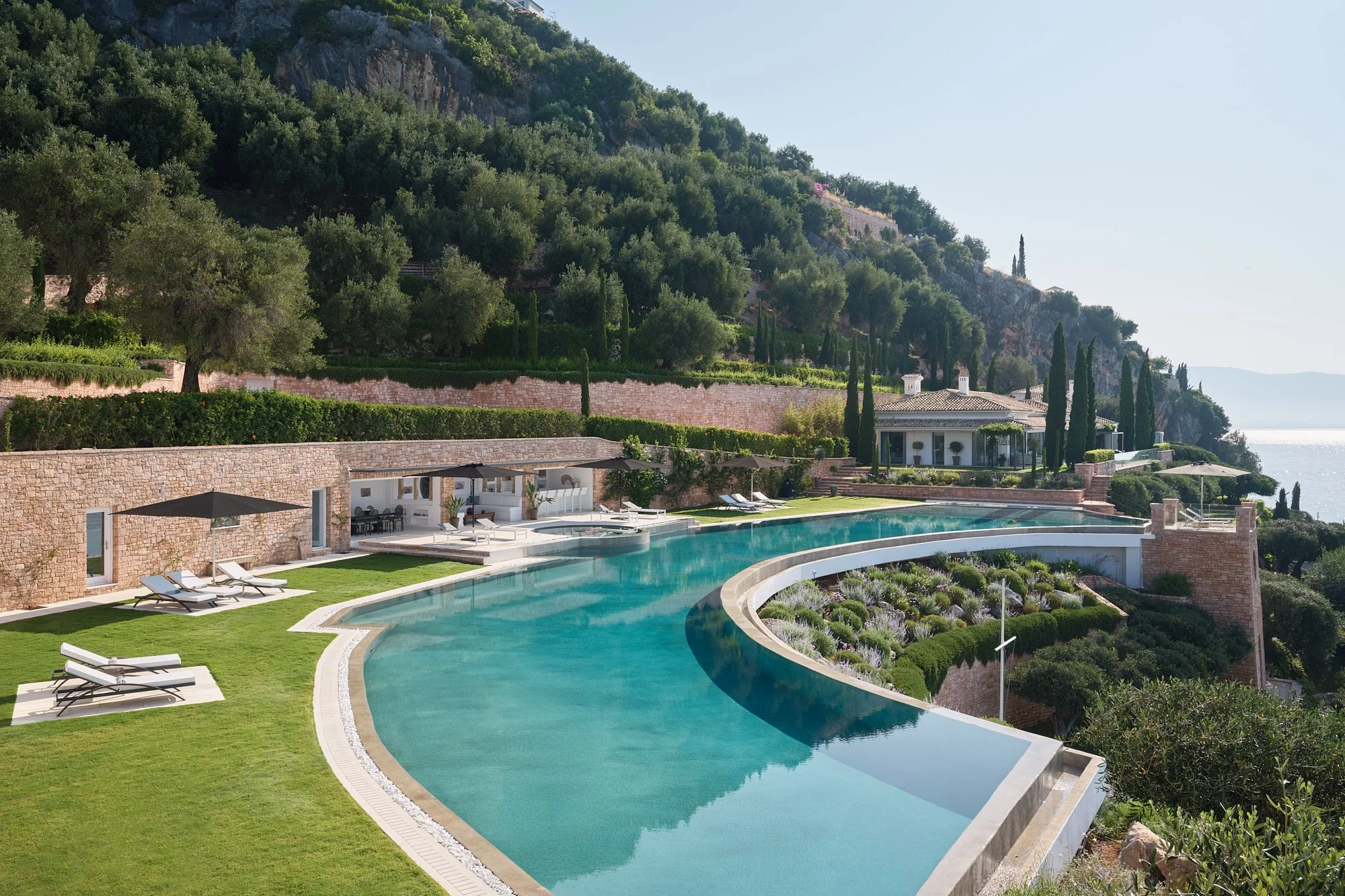 40. Pool and Sunbathing Areas View across to Guest House.jpg