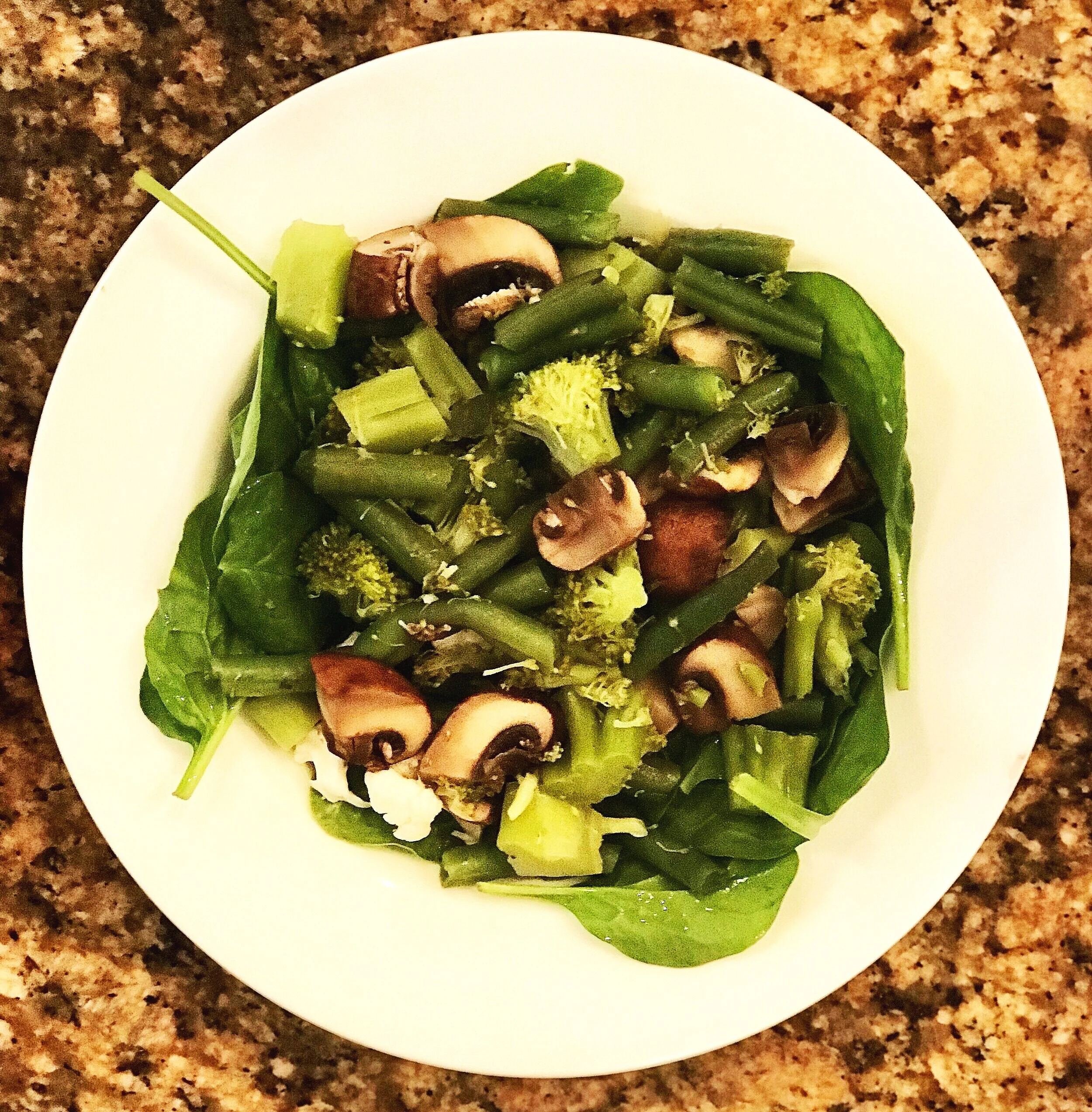Steamed Veggies on a Bed of Spinach