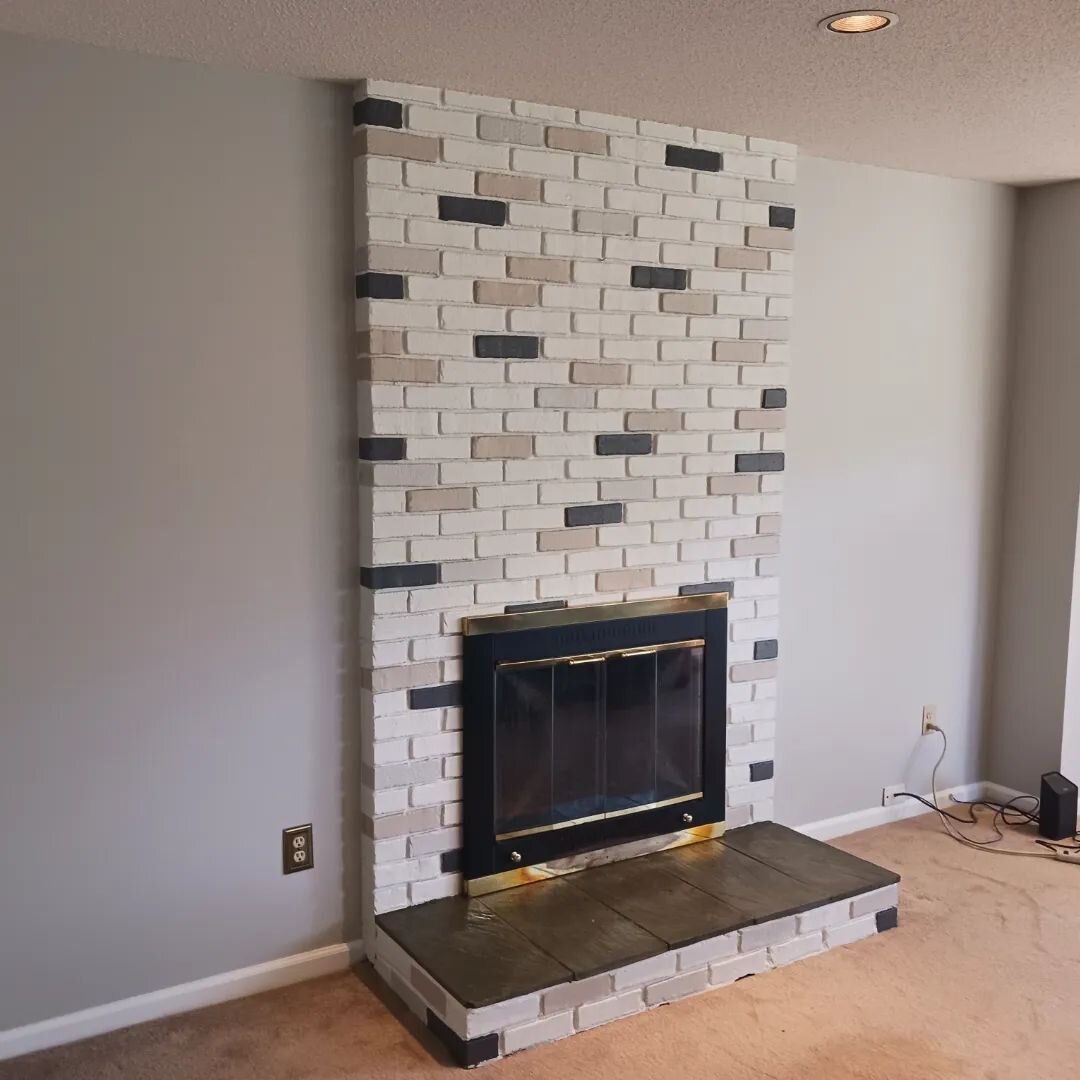 Want a one of a kind look? Check out this interior repaint of walls, trim &amp; brick. The custom paint pattern over the fireplace brick completely transformed the look &amp; feel of this space. We used Stonington Gray (HC-170) for living room walls 