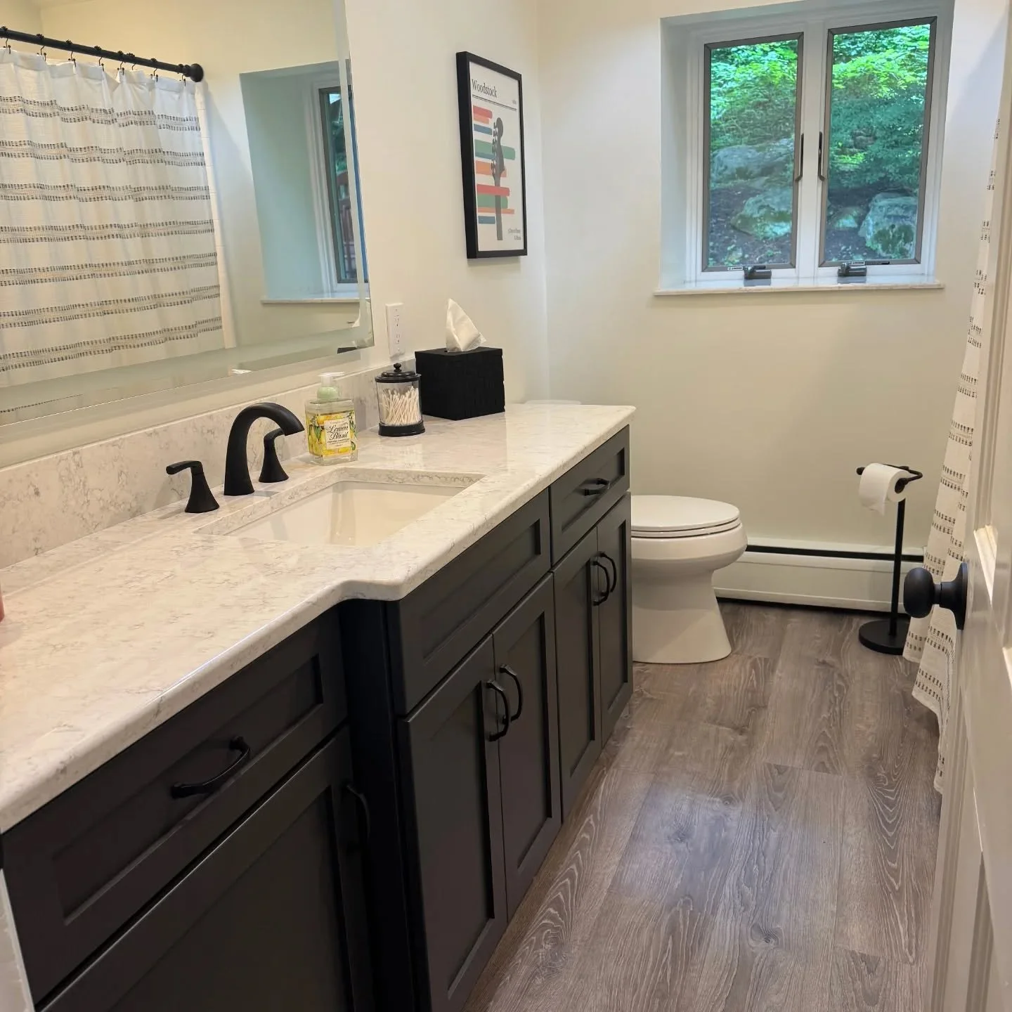 Earlier this summer, painted a remodeled bathroom. ✨🛁 Gave it a total makeover to freshen it up from the wood look &amp; pink walls. Used the color Beach House (B003 BWC-04) on the walls using Duration in a satin sheen. Primed using Extreme Block &a