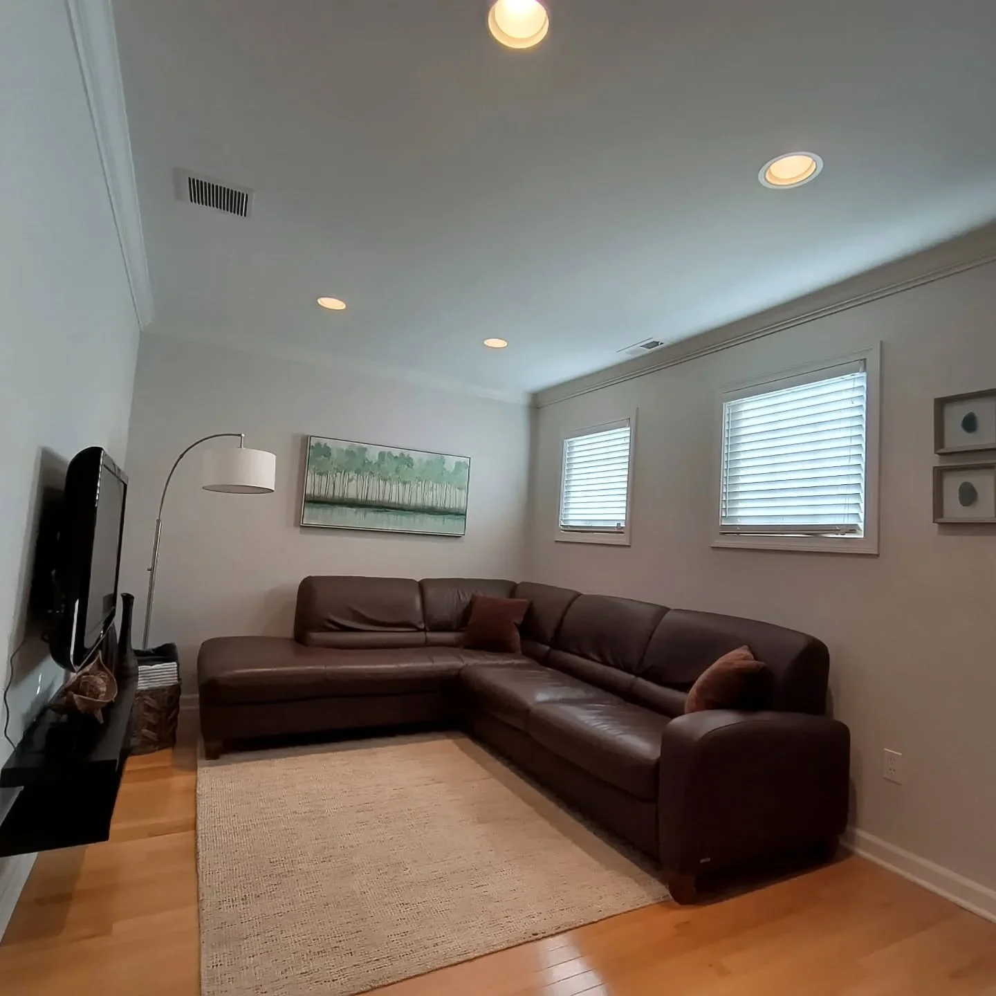 If you're looking for a soft gray/beige toned color for your interior, you should consider Pale Oak (OC-20), seen here in this recent re-paint. It works well in large or smaller areas such as in this open space or laundry room. We used Regal Select b