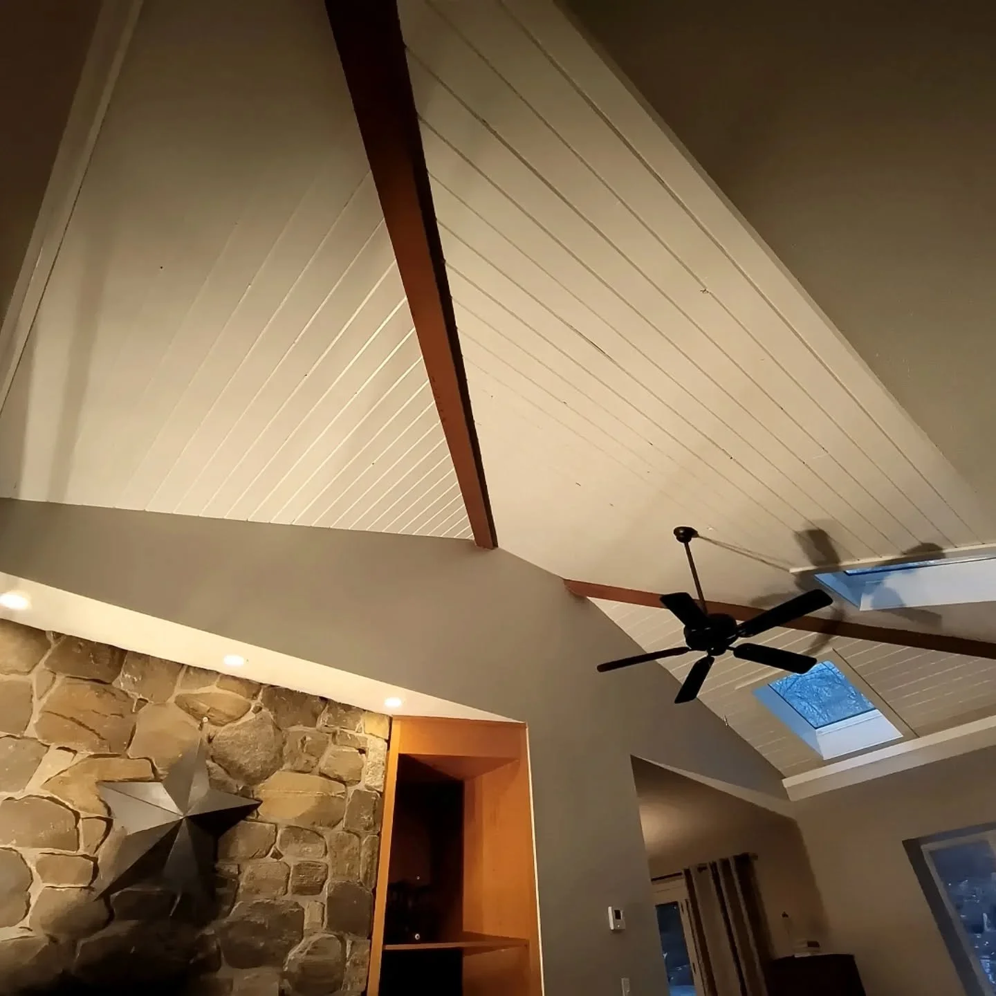 Looking to freshen up your high ceiling? Check out this recent repaint, brushed in with Sherwin-Williams Emerald - Extra White in a semi-gloss sheen. Hallway ceiling, walls, trim &amp; doors were also freshened up. Wall color: Natural Gray - PPU18-10