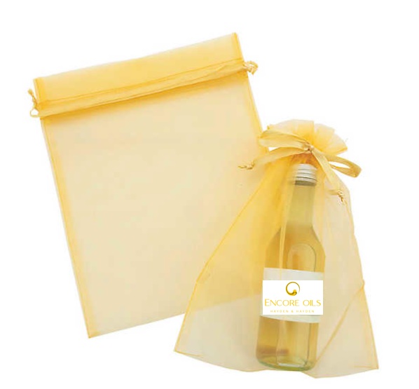 Encore oils gold bag & bottle gift.jpg