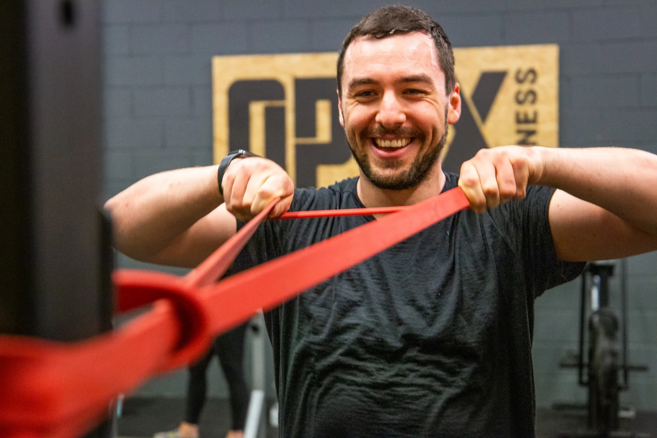 Personal training client enjoying training at OPEX