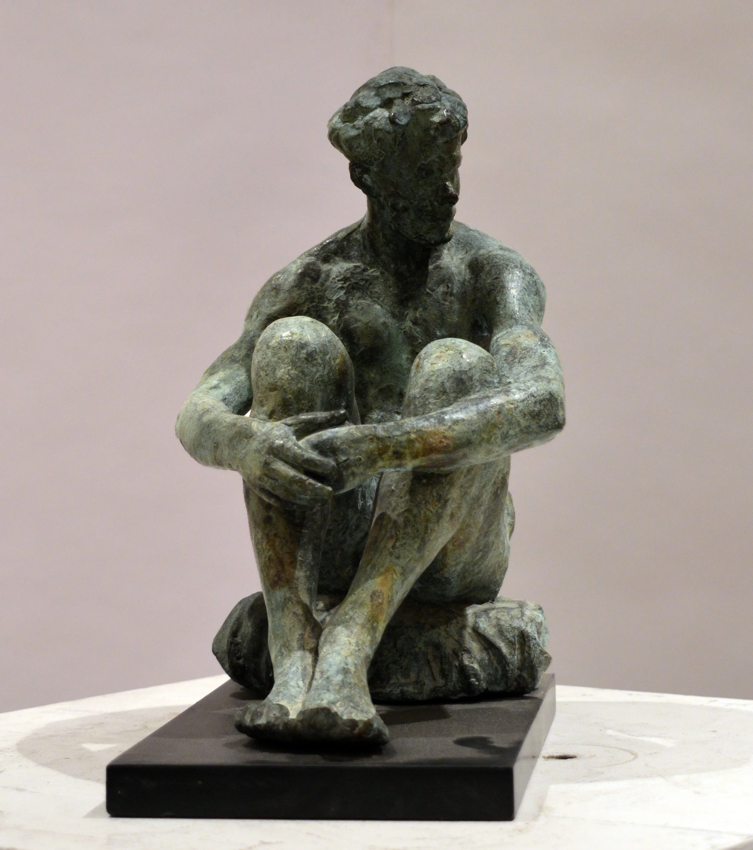 32. Seated Male on Cushion