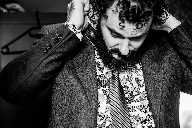 groom black and white photo