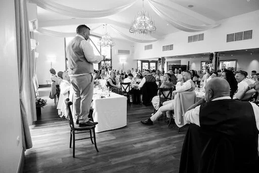 man standing on chair