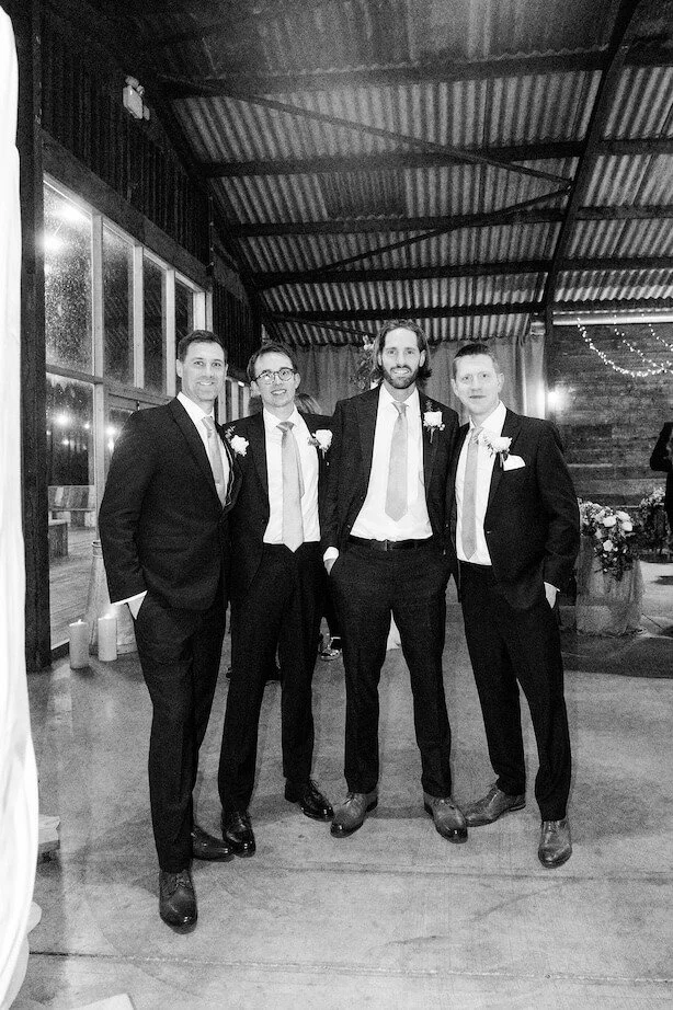black and white photo of groomsmen