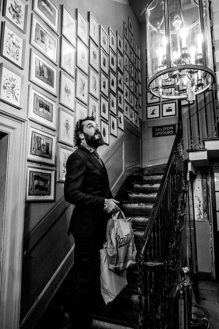 black and white photo of groom