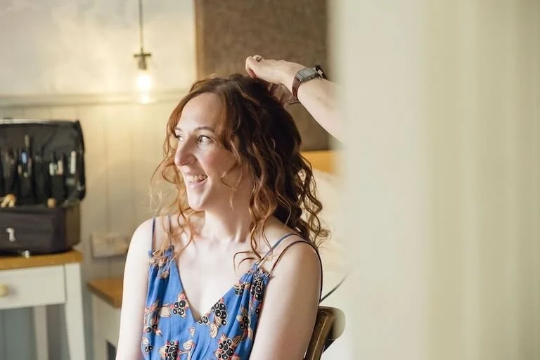 bride having hair done