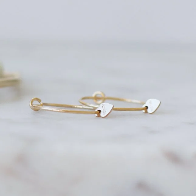 Gold filled wire hoops with tiny hearts