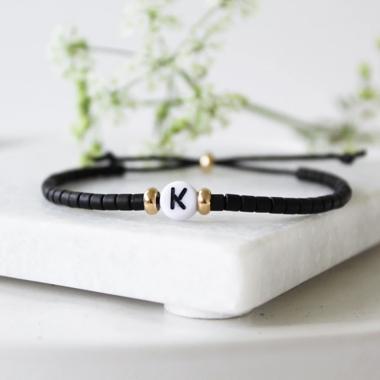 Black and gold summer initial bracelet 