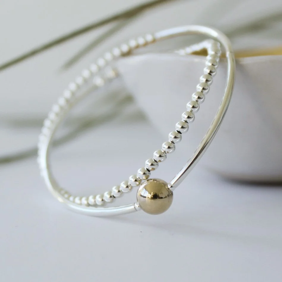 Silver double wrap bracelet with gold filled focal bead