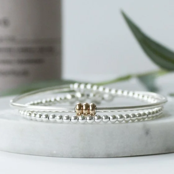 Silver double wrap bracelet with gold rings
