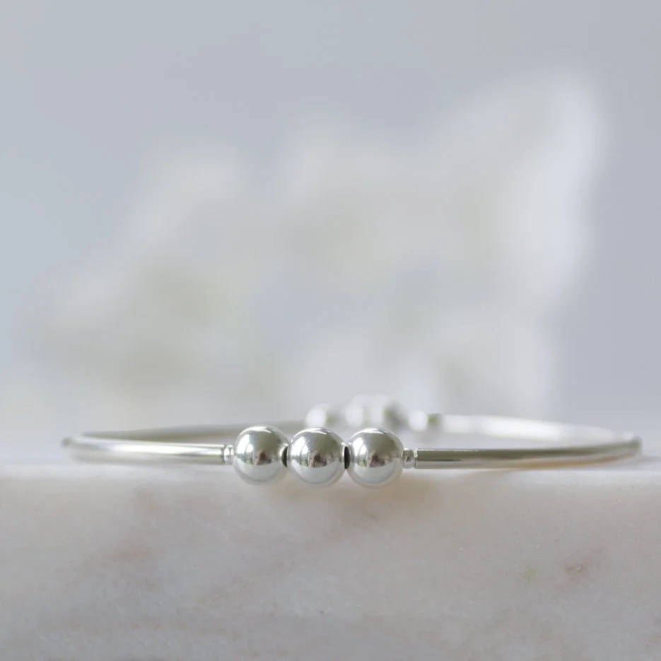 Silver bracelet with 3 balls