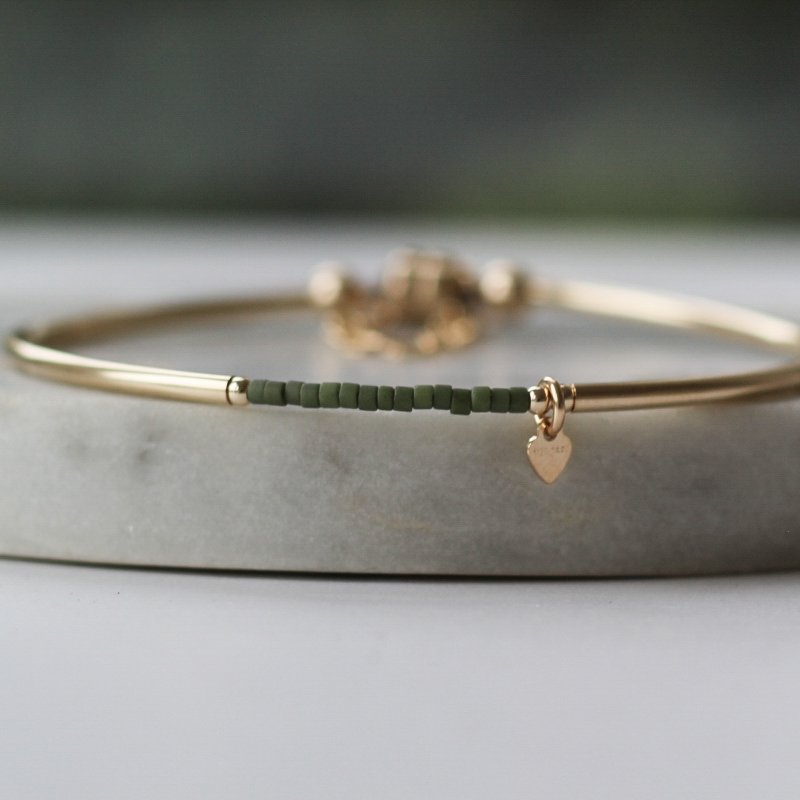 Gold bracelet with olive green Miyuki beads and tiny heart