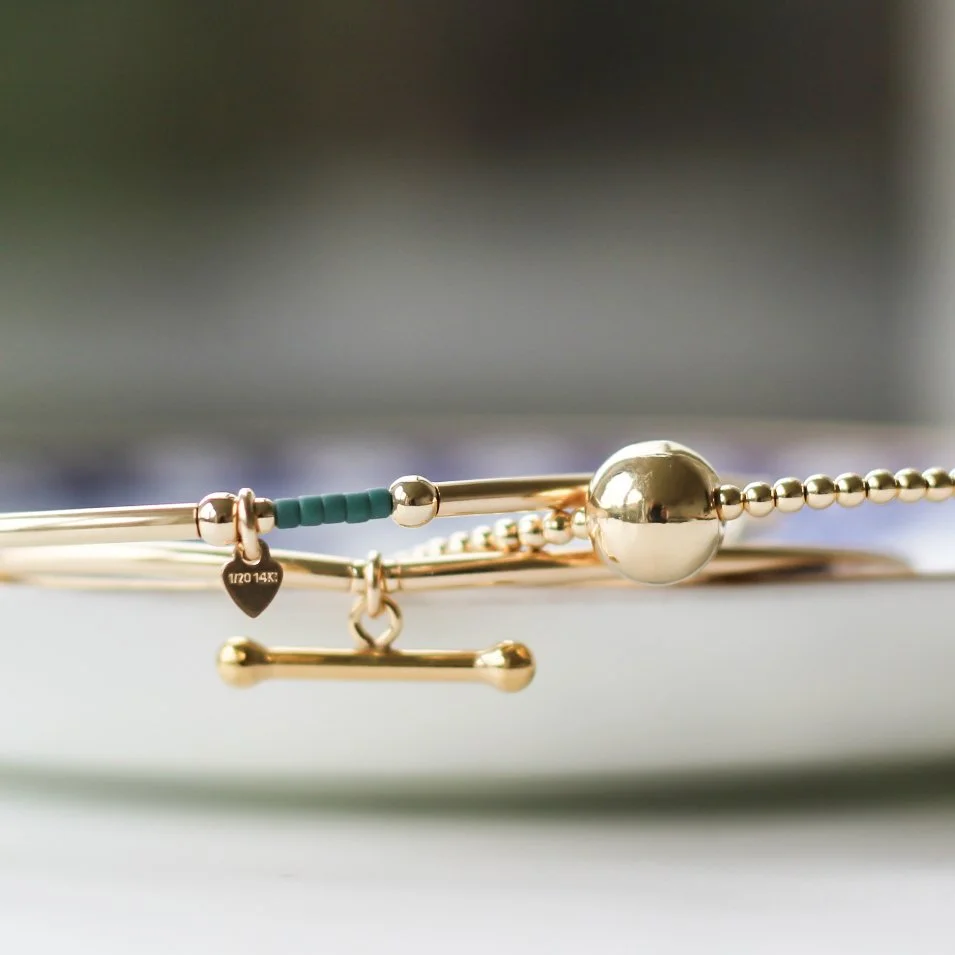 gf teal, t bar, dainty bracelets.JPG