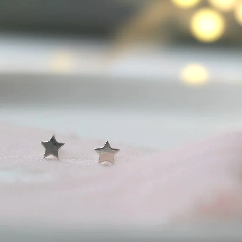 Silver star stud earrings