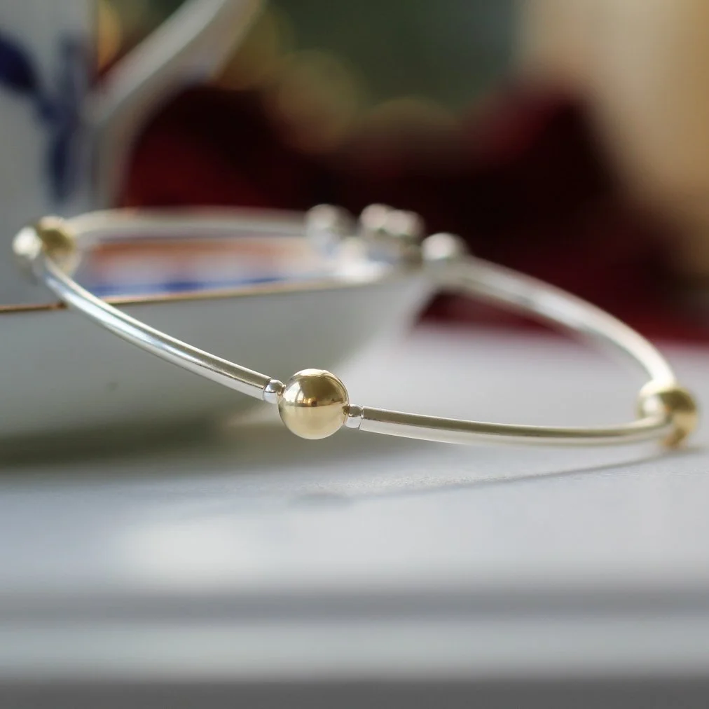silver bracelet with 3 gold filled balls.JPG