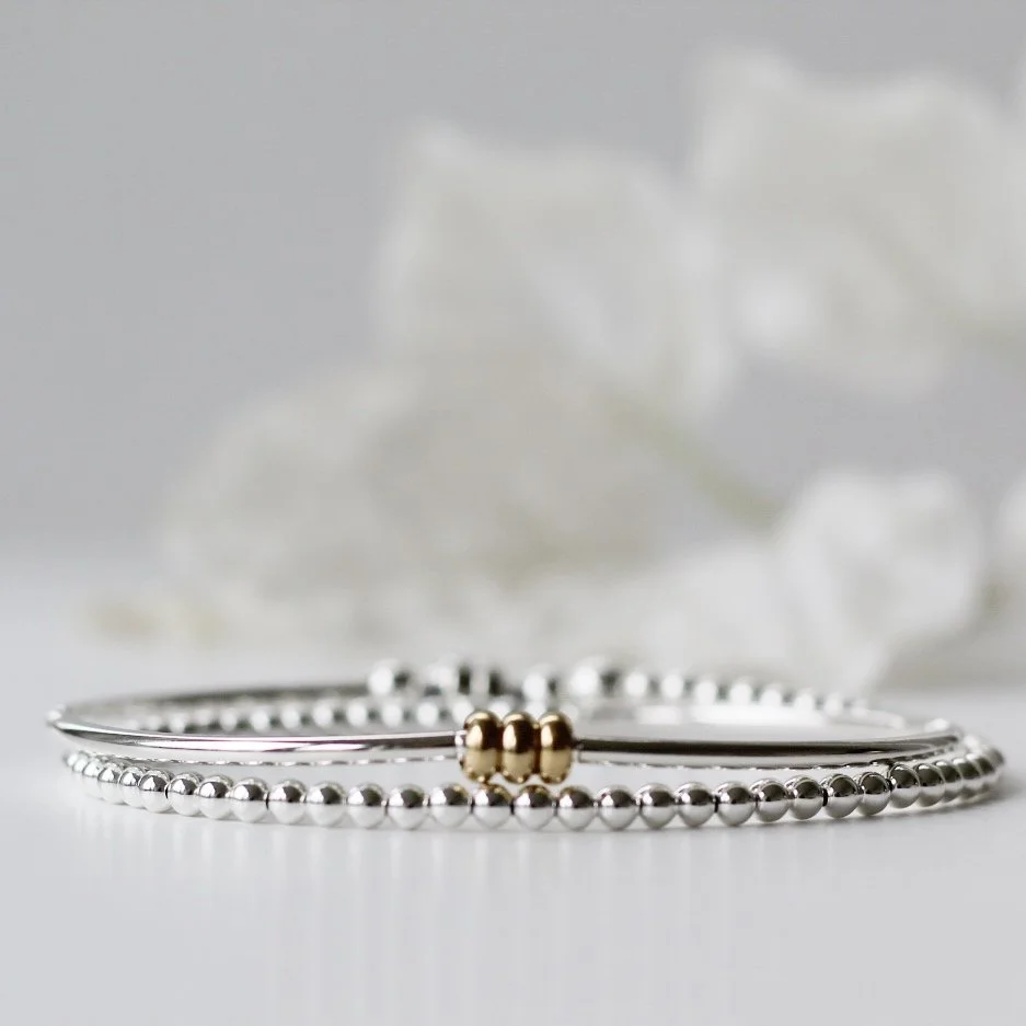 Silver double wrap bracelet with gold rings