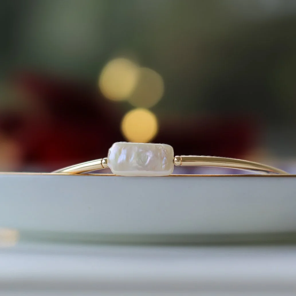 Gold filled bracelet with a freshwater 'stick' pearl