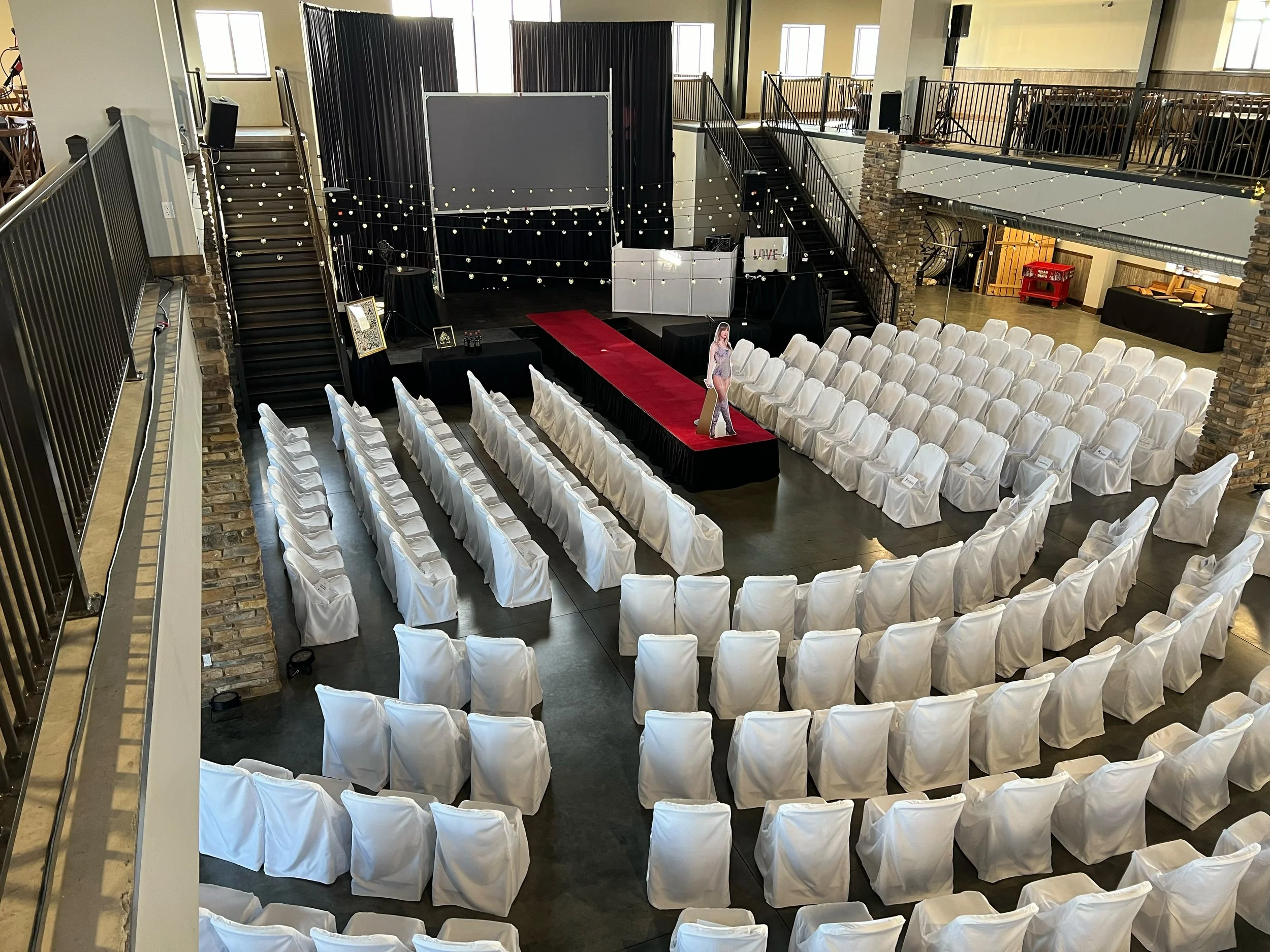 Birds Eye View of Red Carpet Runway Stage Setup and Seating Arrangement at Fundraiser Jefferson City Missouri