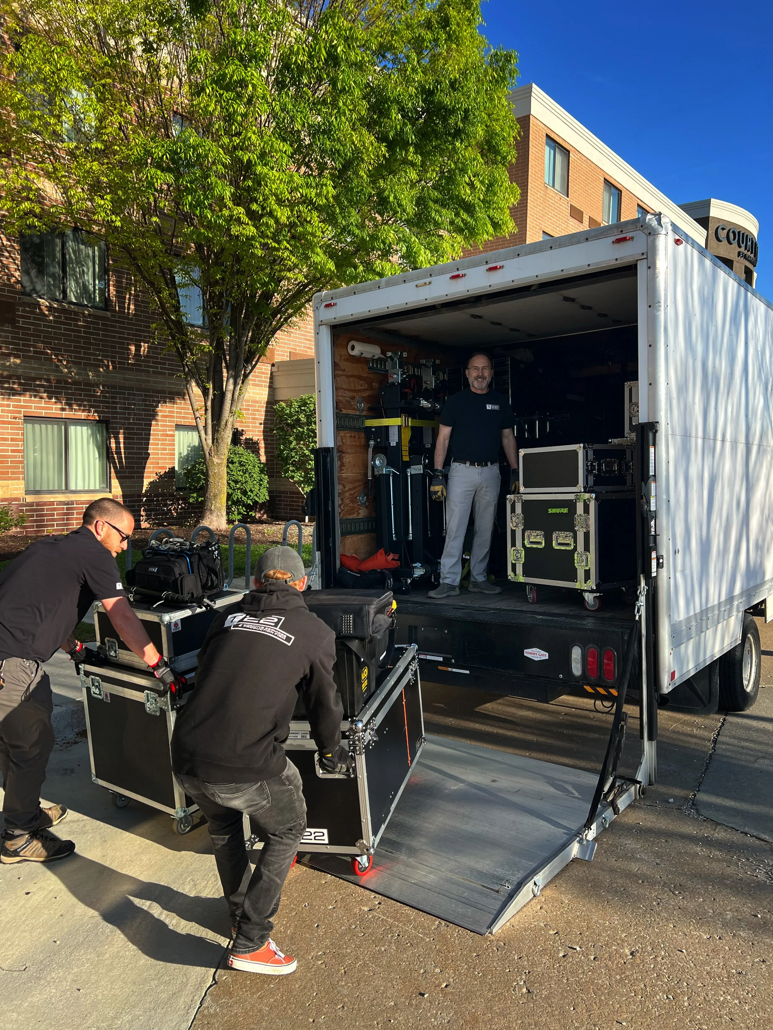Audio visual team unloading truck for a larger corporate conference in Columbia Missouri