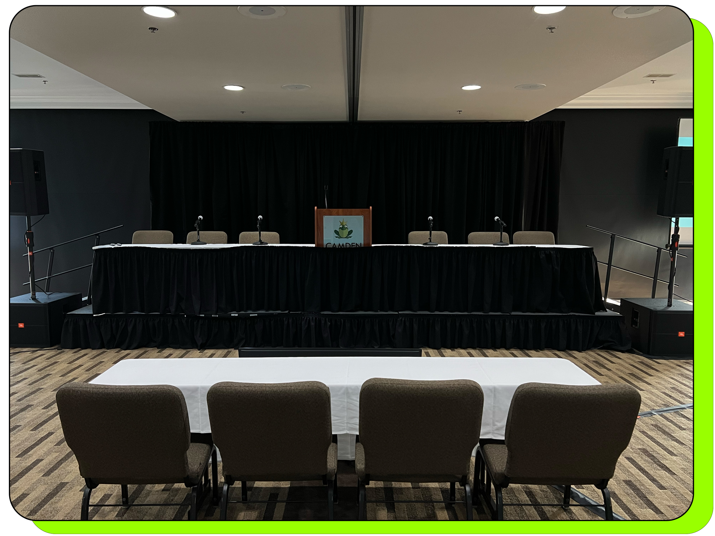 Small Panel setup with 4 microphones, black pipe and drape, small stage at Camden On The Lake Resort Lake of the Ozarks Missouri
