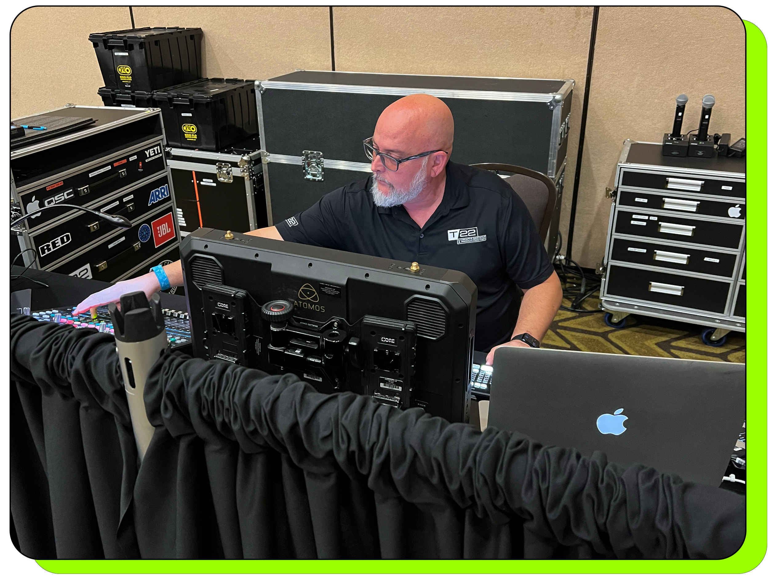 Audio visual technician managing all sound and video technologies during a conference