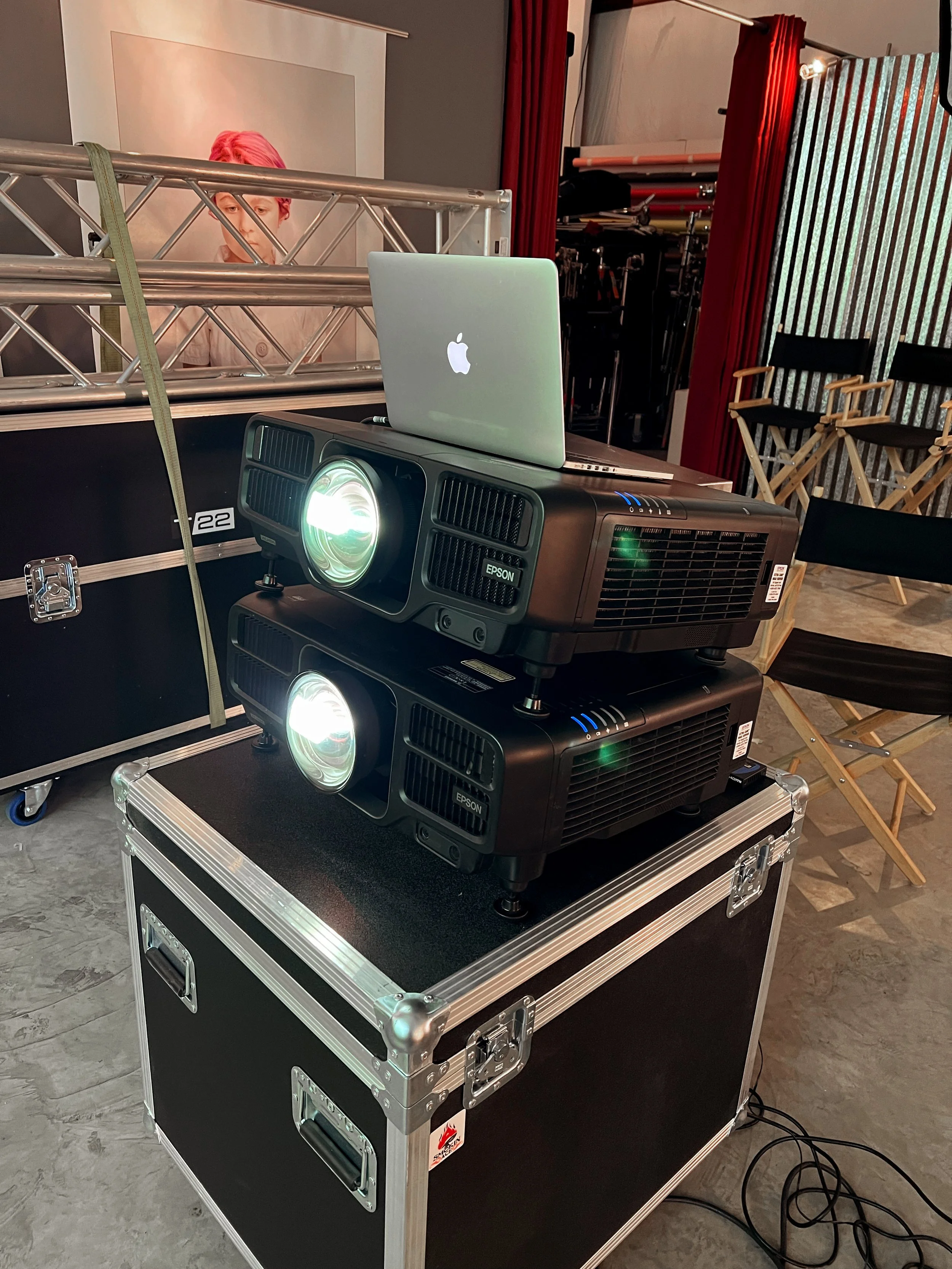 MacBook Pro connected to two projectors