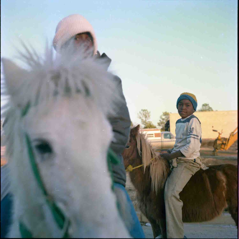   Boys on Horseback  Color Archival Print 14 x 14 in. (image size) The Do Good Fund, Inc., 2016-004 