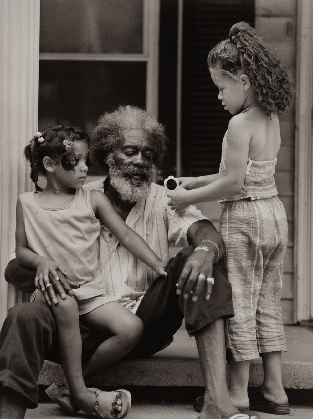   Lucious Thompson with Destiny Clark and Delena Brooks , Tom Biggs Hollow, McRoberts, Letcher County, Kentucky Image: 2002/ printed: 2011 Gold-tone Gelatin Silver Print 13 × 9 3/4 in. (image size) The Do Good Fund, Inc., 2016-082 