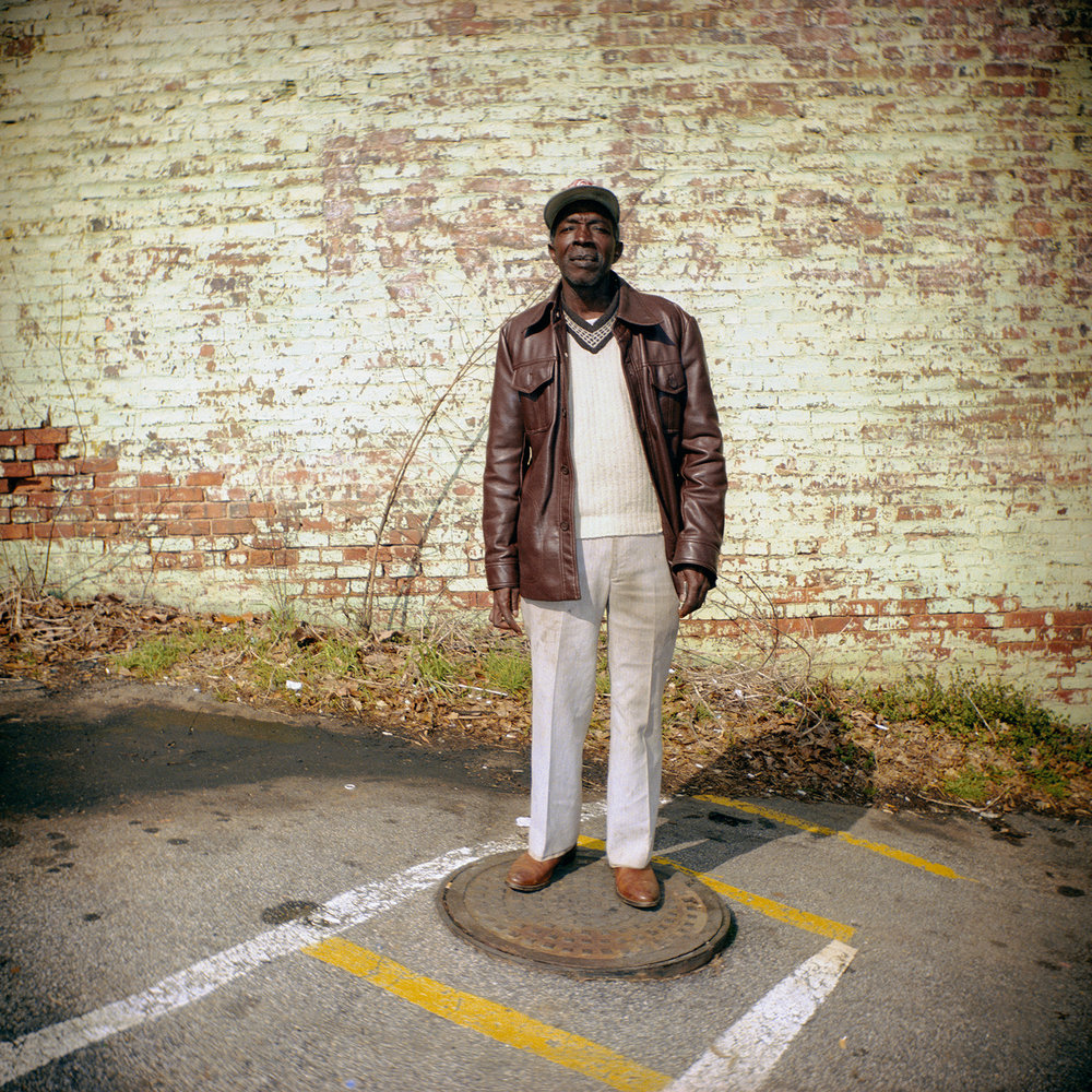   Man on Manhole Cover , 1992-1994/ Printed: 2016 Edition: 7/15 Chromogenic Print 14 × 14 in. (image size) The Do Good Fund, Inc., 2016-011 