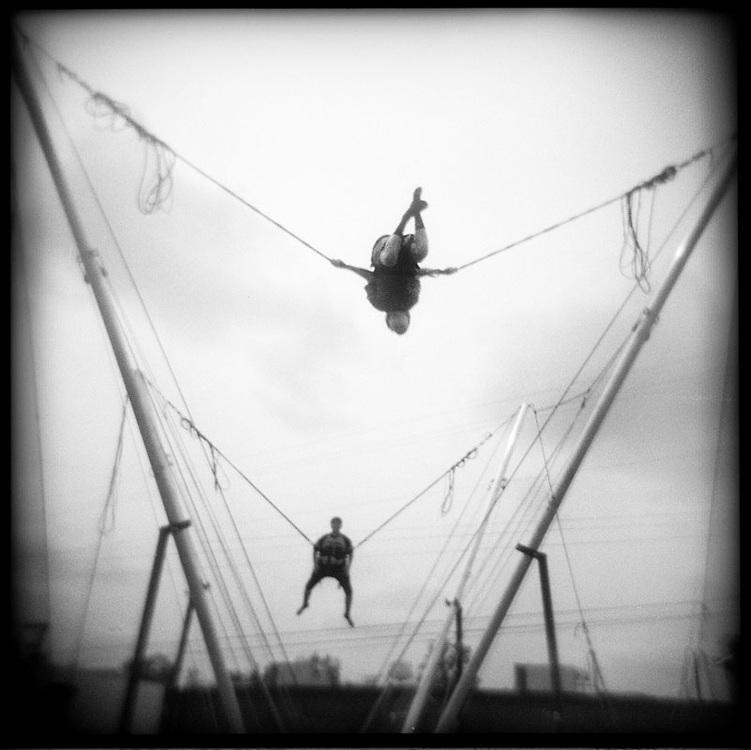   Bungee jumping, Bodock Festival, Pontotoc, Mississippi , 2012/ Printed: 2016  Edition: 1/25  Silver Gelatin Print 14 × 13 7/8 in. (image size) The Do Good Fund, Inc., 2016-062 