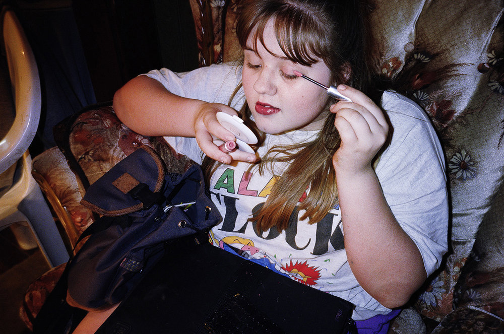   Megin putting on makeup , 1996 Edition: 1/5 Archival Pigment Print 11 1/2 × 17 1/4 in. (image size) The Do Good Fund, Inc., 2017-111 