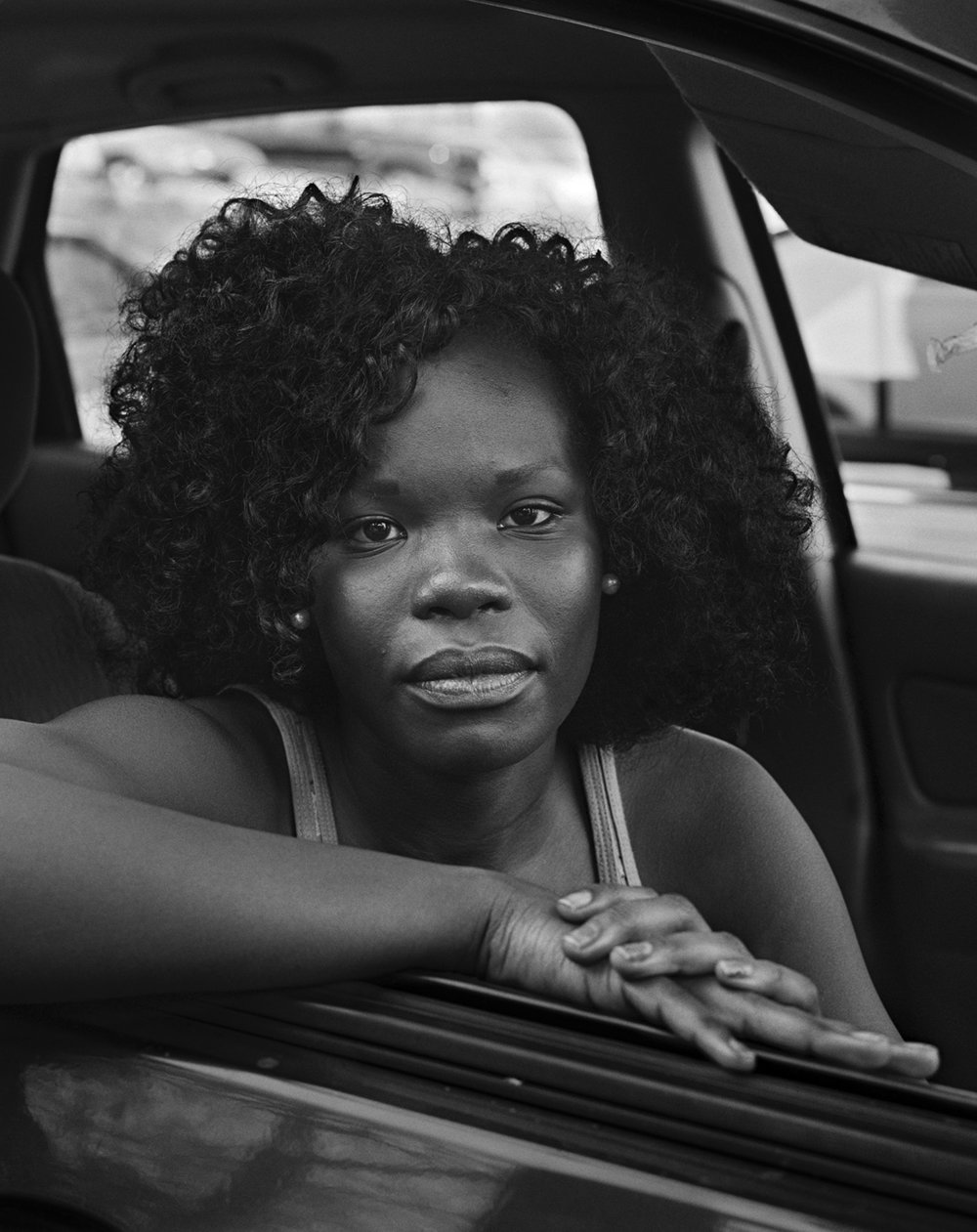   Rosa in the car by James River, Richmond, Virginia , 2012 Edition: 3/10 Archival pigment print 20 × 16 in. (image size)  The Do Good Fund, Inc., 2017-116 