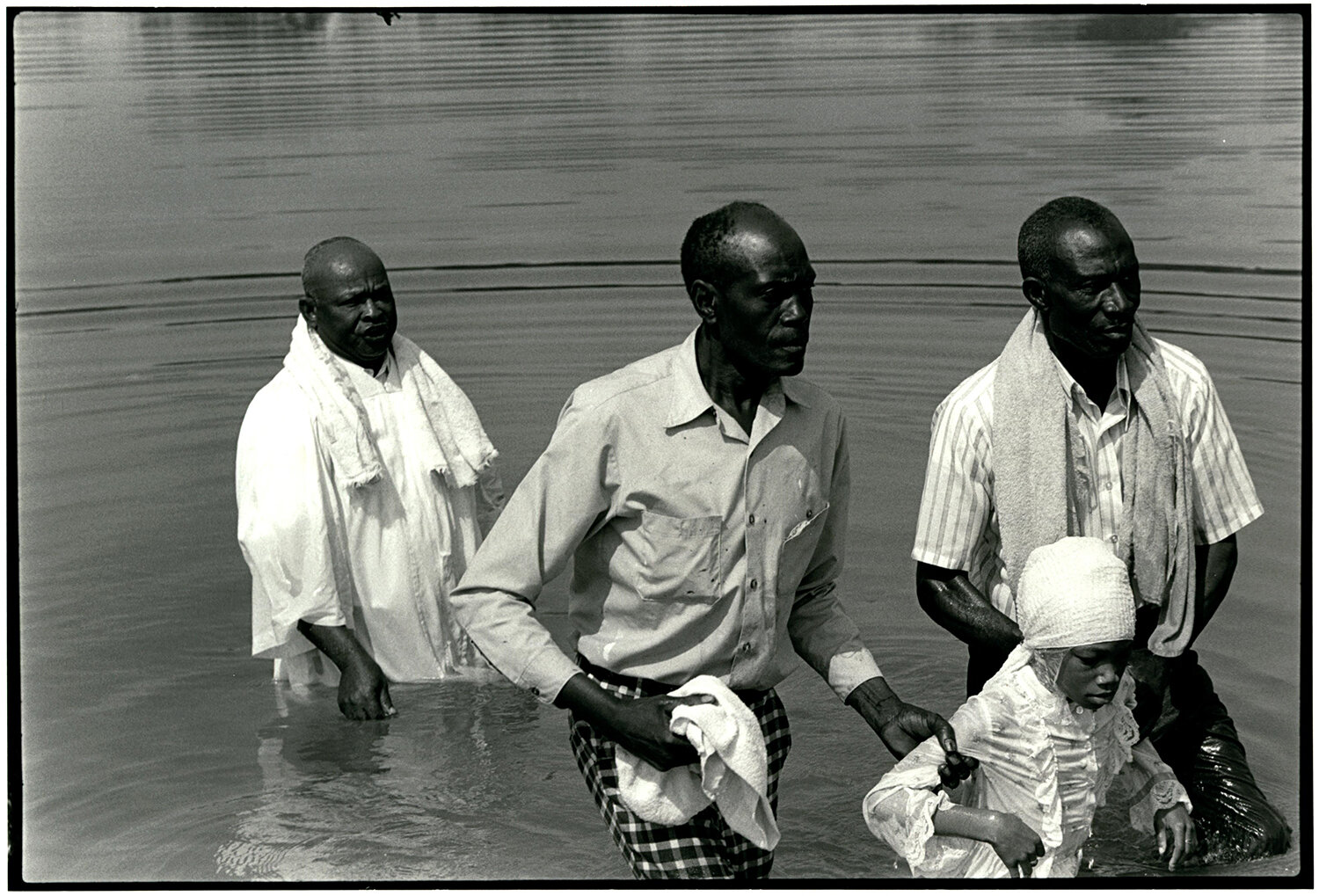   Rev. Mitchell and Lisa Spear at a Mt. Zuma baptism in the Flint River , 1977 Silver Gelatin Print 8 3/4 × 13 in. (image size) The Do Good Fund, Inc., 2017-28 