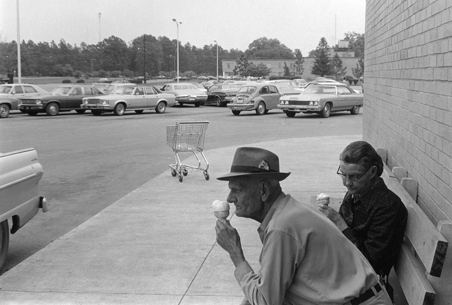   Man and wife at Bainbridge Mall , 1976 Silver Gelatin Print 6 1⁄2 x 9 1⁄4 in. (image size) The Do Good Fund, Inc., 2017-76 