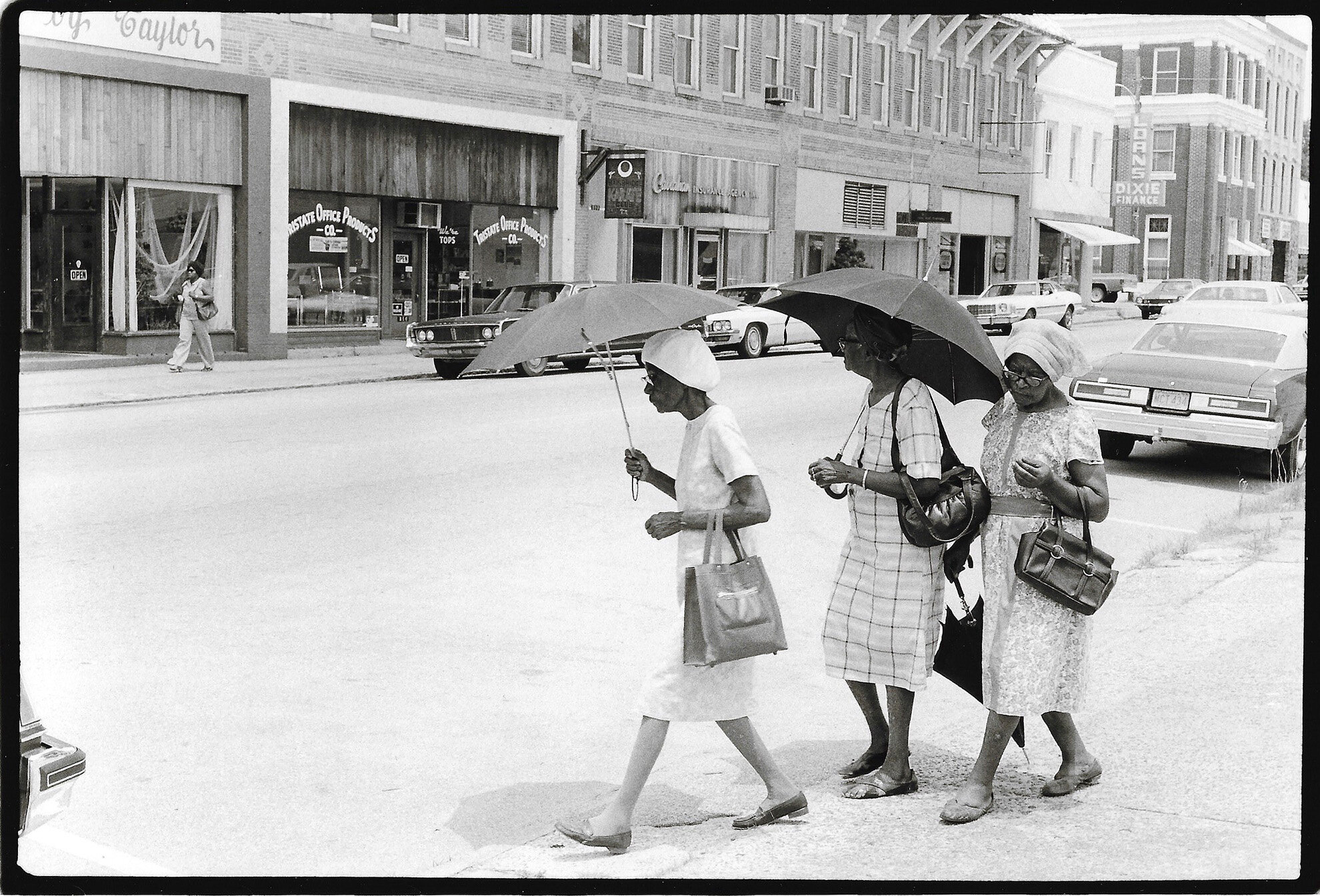   Women Crossing Broad Street, Bainbridge, GA,  1978 Gelatin silver print 6 x 8 3/4 in. (image size) The Do Good Fund, Inc., 2020-057 