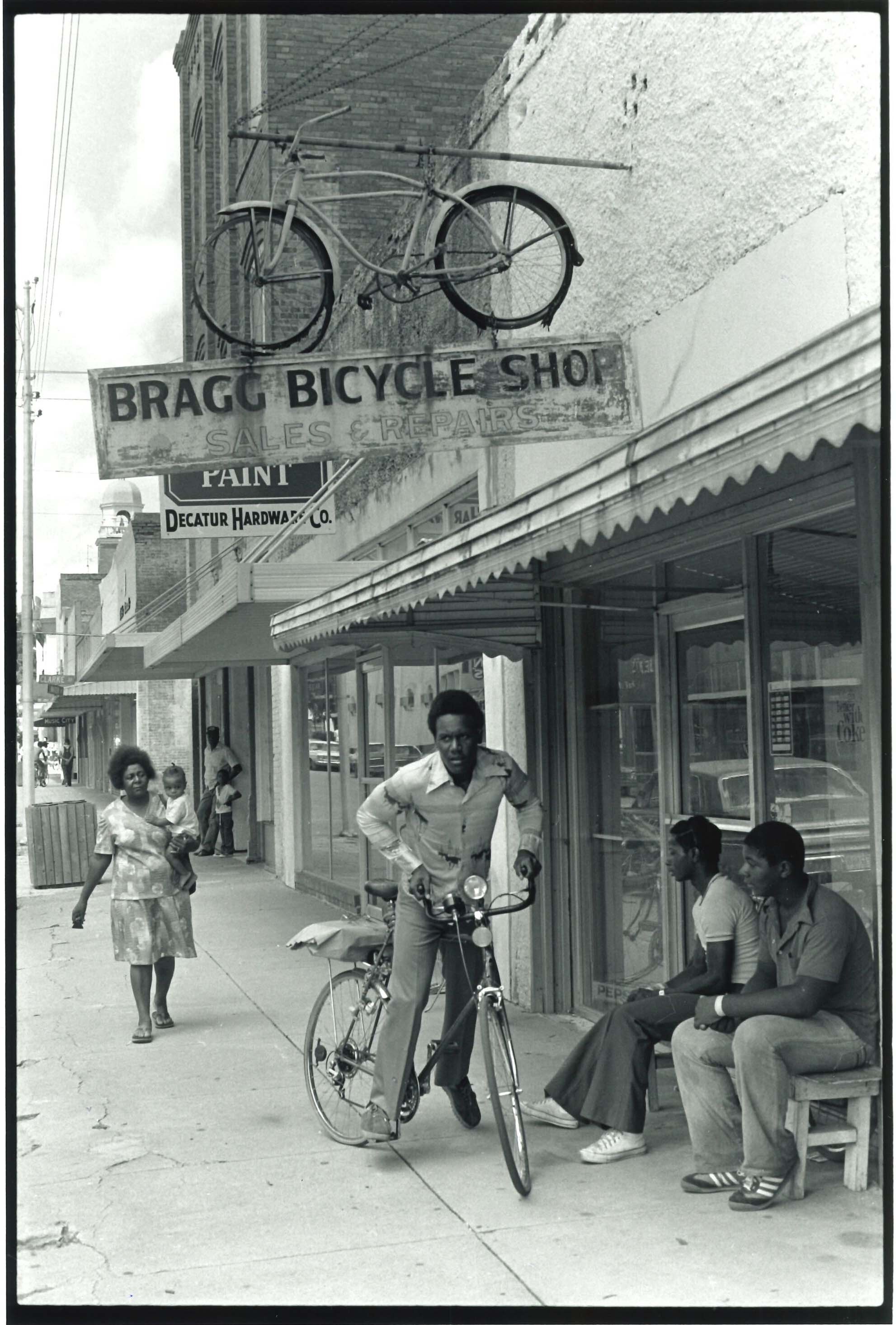   Bragg Bicycle Shop on Water Street Looking West, Bainbridge, GA  Image: 1979/printed: 2020 Gelatin silver print 9 3/4 x 6 1/2 in. (image size)  The Do Good Fund, Inc., 2020-061 