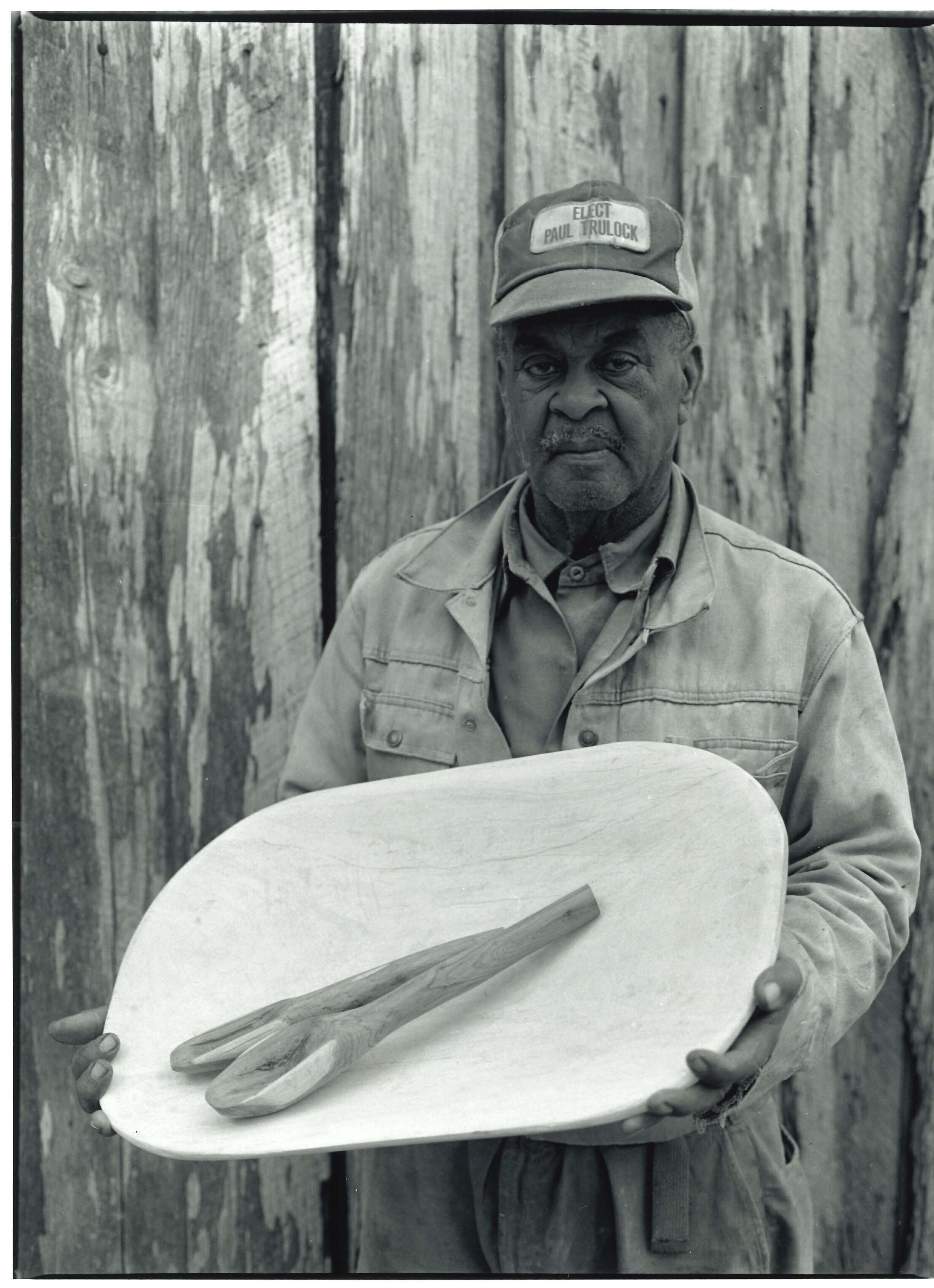   Mr. Lee Bradwell Holding Hand Carved Bowl and Utensils, Climax, GA , 1980 Gelatin silver print  11 1/4 x 8 1/4 in. (image size)  The Do Good Fund, Inc., 2020-072 