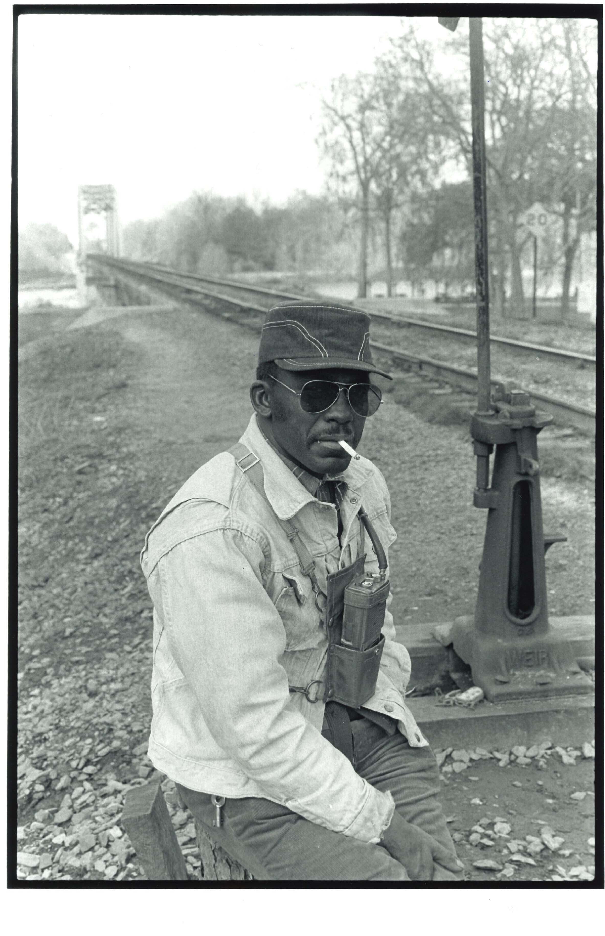   Switchman, Seaboard Coast Line Railroad, Bainbridge, GA  Image: 1981/printed: 2020 Gelatin silver print 11 1/2 x 7 3/4 in. (image size)  The Do Good Fund, Inc., 2020-080  
