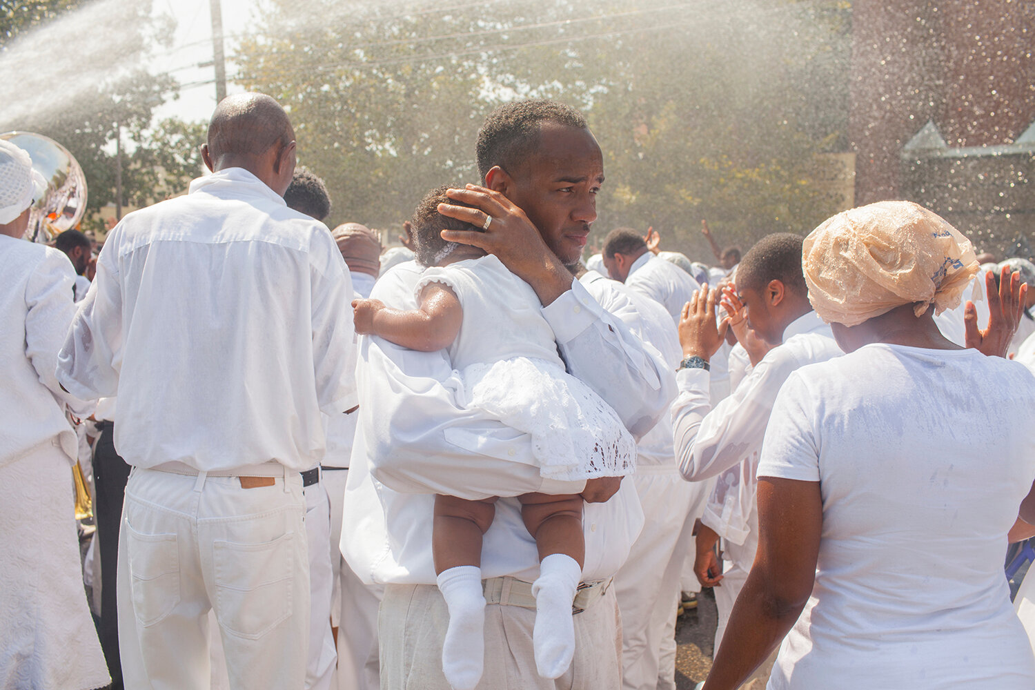   Firehose baptism, Newport News, Virginia  Image: 2013/printed: 2020 Edition: 1/10  Archival pigment print 16 x 24 in. (image size)  The Do Good Fund, Inc., 2020-005  
