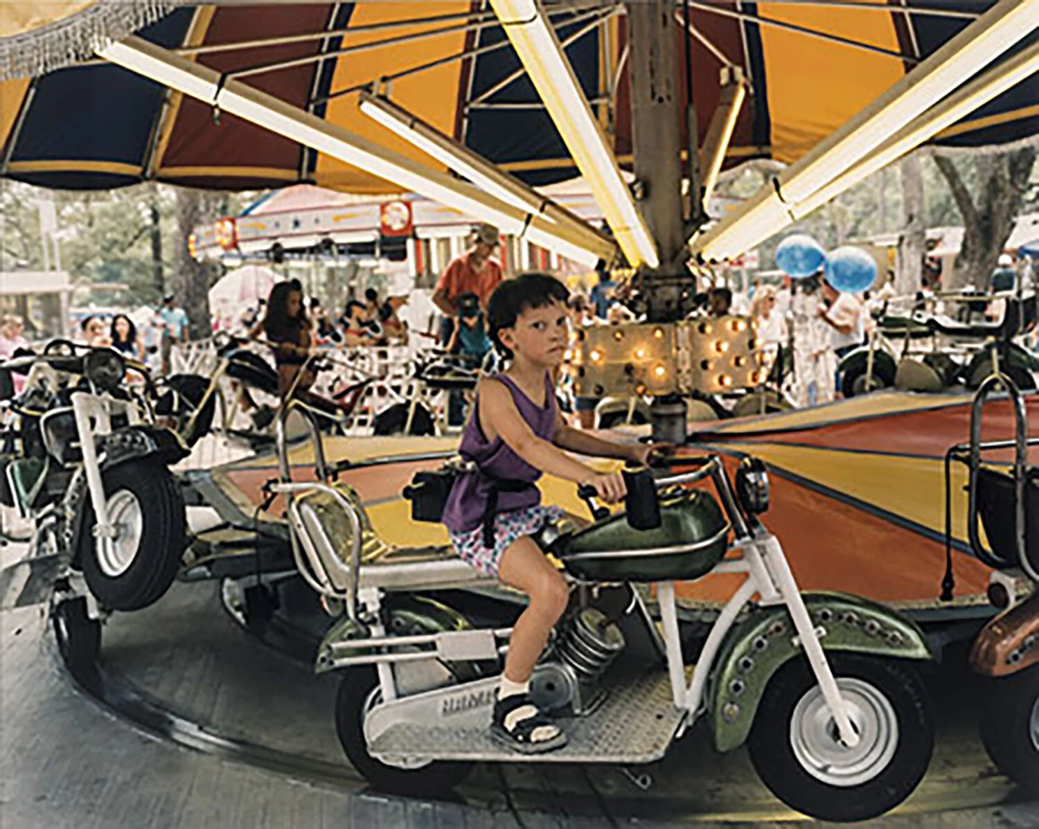   Girl on Toy Motorcycle, Mandeville, LA, 1996  Edition: AP Chromogenic Print  15 3/4" x 19 3/4 in. (image size) The Do Good Fund, Inc., 2015-036 