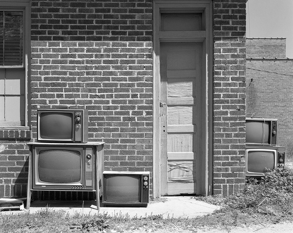   TV Sets, Hughes, AR , 1986 Archival pigment print  15 x 19 in. (image size) The Do Good Fund, Inc., 2016-27 