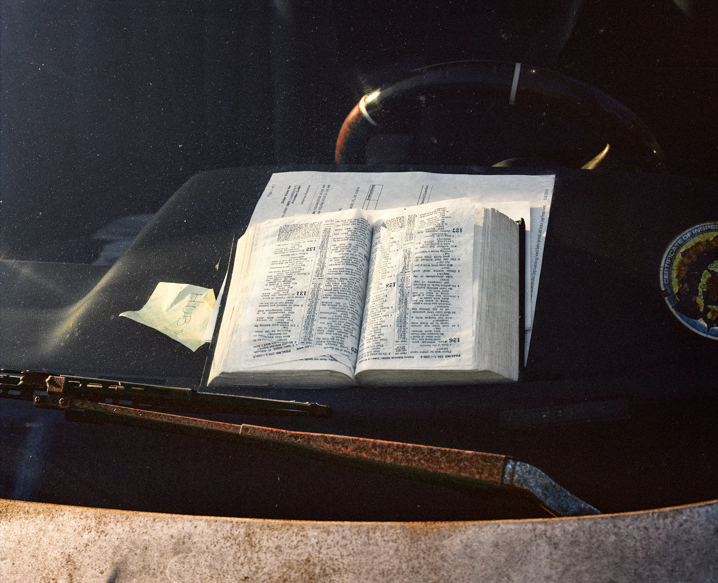   Bible in Mr. Brown’s Car, 2017   Archival Pigment Print  16x19 5/8 (image size)  The Do Good Fund, Inc. 2025-008 