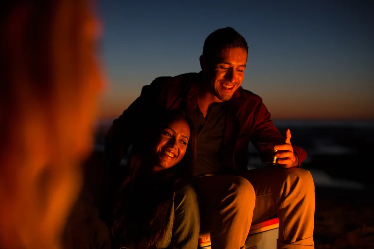 CoupleOnBeachRed.jpg